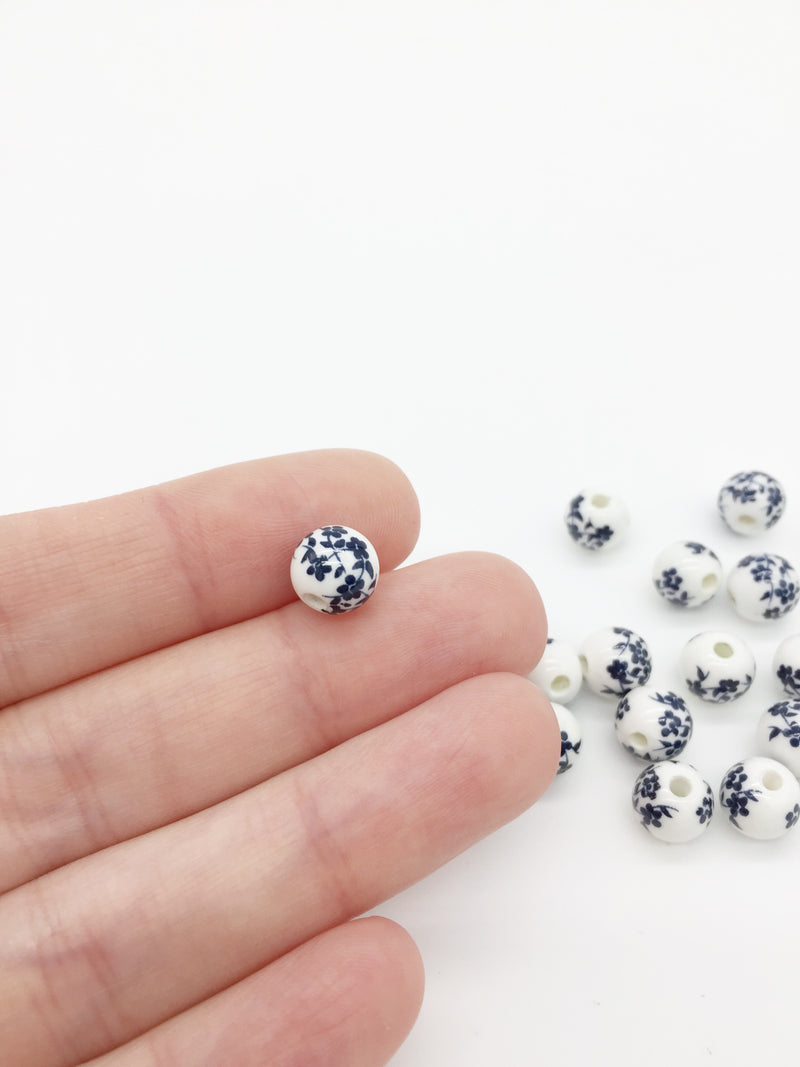 10 x Round White Ceramic Beads with Navy Blue Floral Pattern, 8mm (3875)