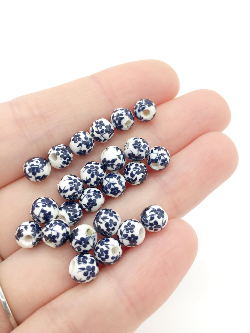 10 x Round White Ceramic Beads with Navy Blue Floral Pattern, 6mm (3874)