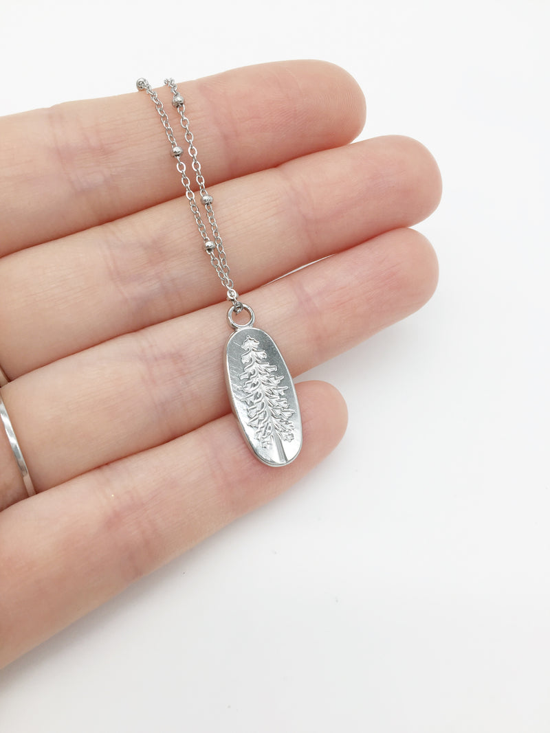 1 x Stainless Steel Oval Pendant with Embossed Pine Tree Pattern, 24x10mm (3996)