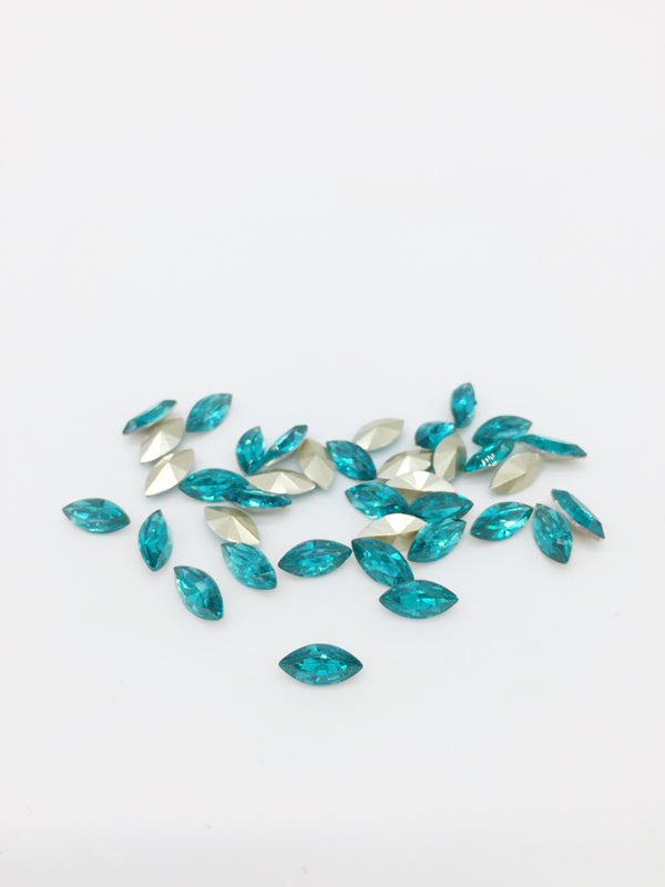 24 x 5x10mm Sea Blue Crystal Navette Rhinestones, Foiled Back (4085)