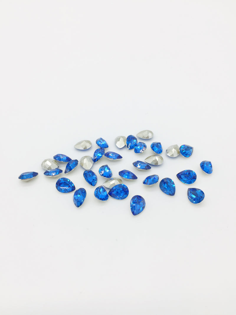 36 x 6x8mm Light Sapphire Teardrop Rhinestones, Foiled Back (4087)