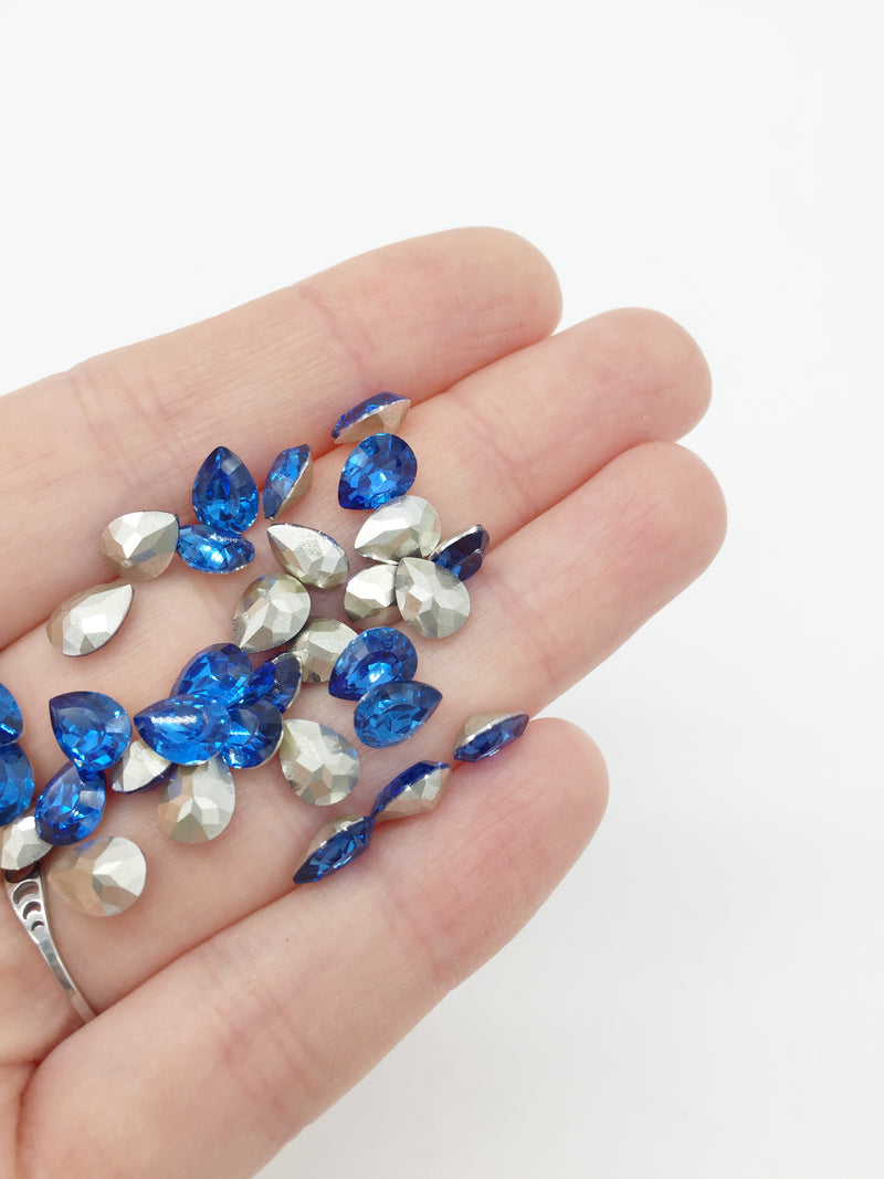 36 x 6x8mm Light Sapphire Teardrop Rhinestones, Foiled Back (4087)