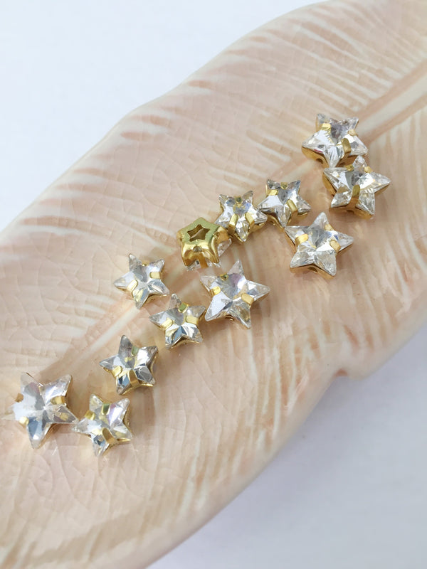 12 x 10mm Clear Crystal Star Rhinestones, Sew-on Gold Base (3482)