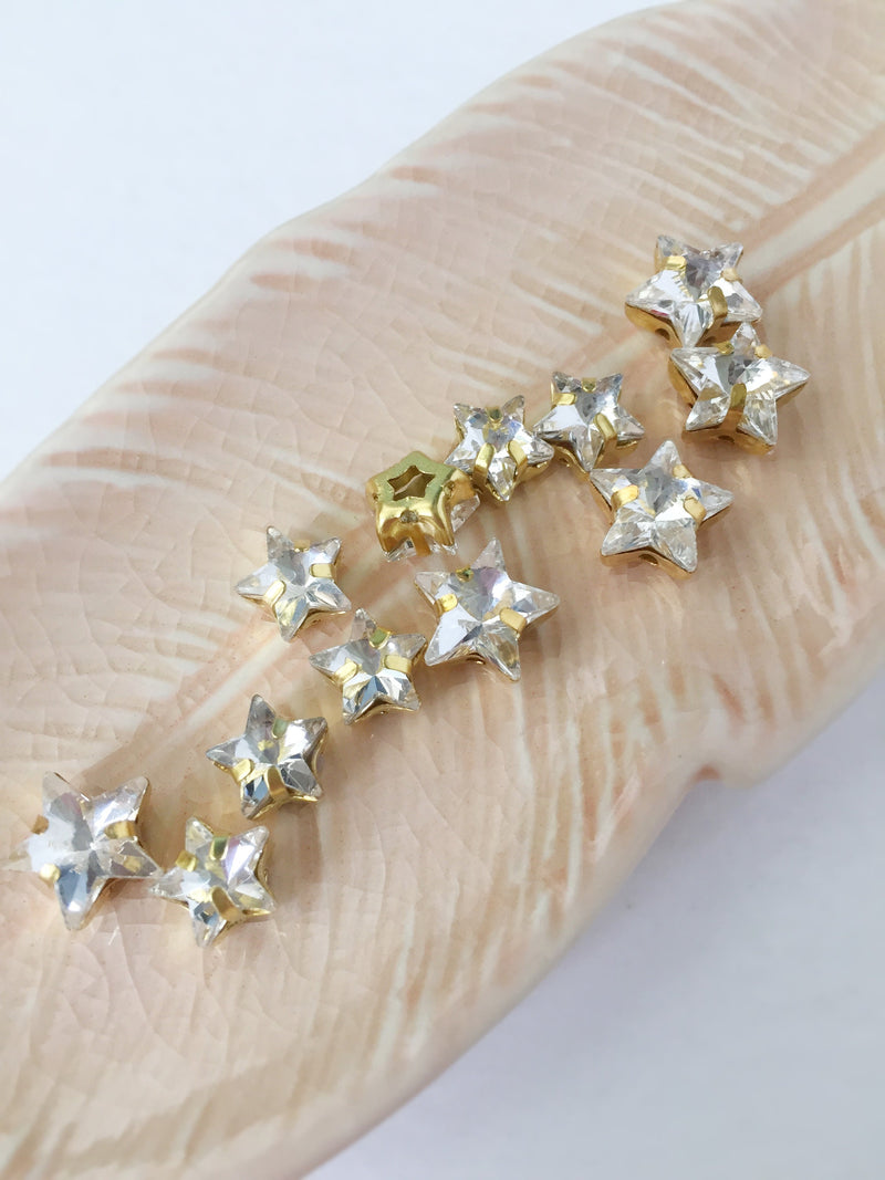 12 x 10mm Clear Crystal Star Rhinestones, Sew-on Gold Base (3482)