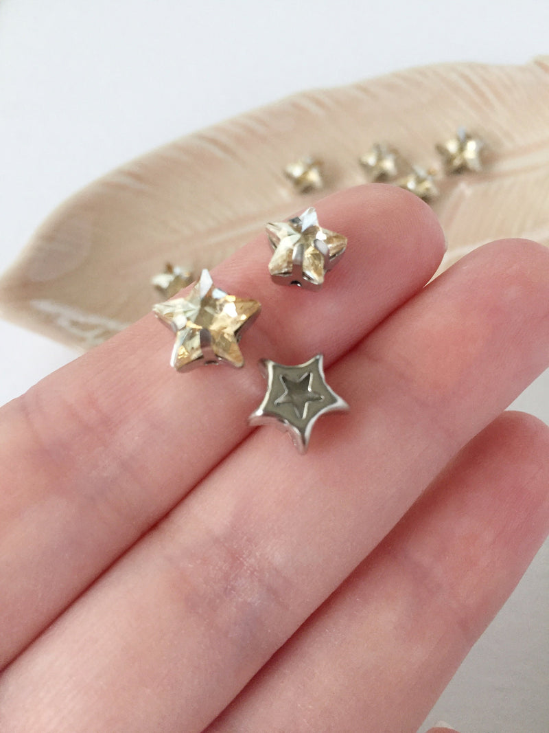 12 x 10mm Golden Shadow Crystal Star Rhinestones, Sew-on Rhodium Base (0308, 0309)