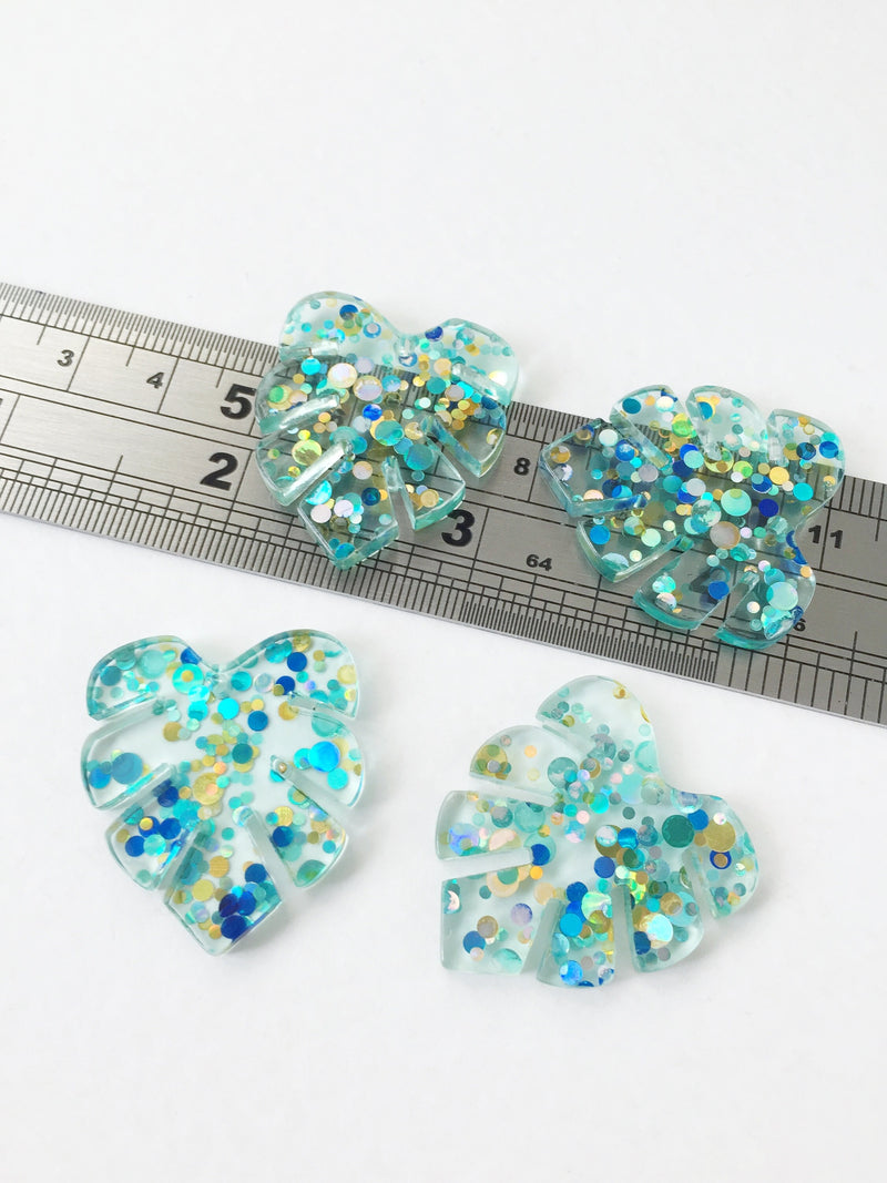 2 x Turquoise Resin Monstera Leaf Pendants with Glitter, 30x26mm (0766)