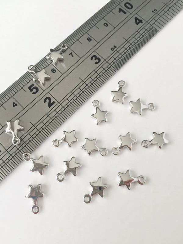 8 x Platinum Plated Star Charms, 7x10mm (0132)