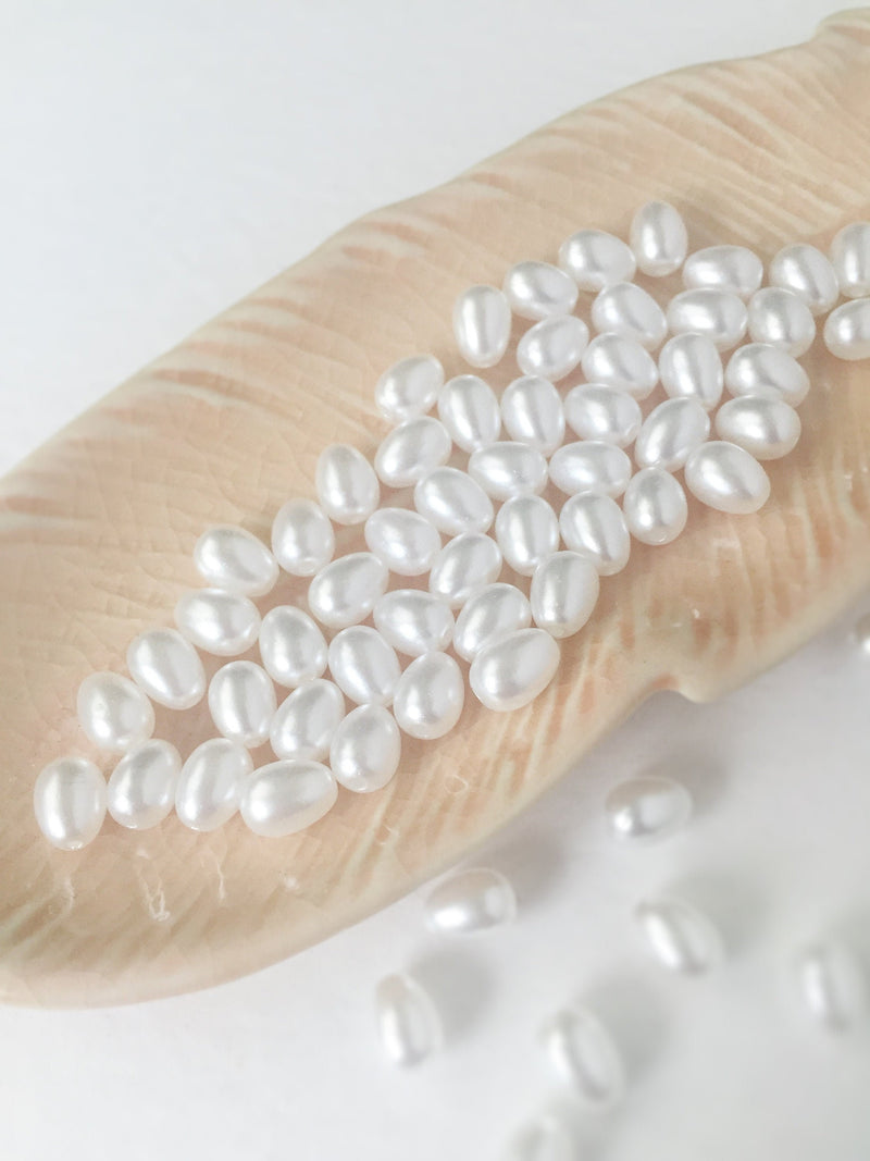 100 x 7x5mm White Acrylic Rice Pearl Beads (3219)