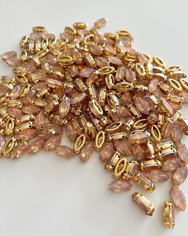 12 x 6x12mm Navette Dusky Pink Opal Rhinestones in Gold Tone sew-on Setting (2774)